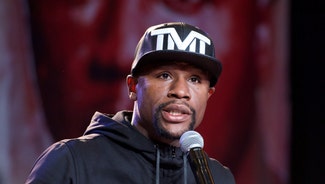 Next Story Image: Floyd Mayweather attempts to end Ronda Rousey feud